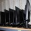 three-shelves-of-desktop-computers,-printers,-&-flat-screen-monitors-image-3