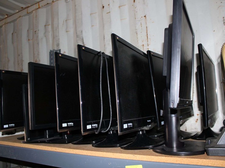 three-shelves-of-desktop-computers,-printers,-&-flat-screen-monitors-image-3