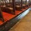10-sections-of-orange-metal-floor-grates-image-13