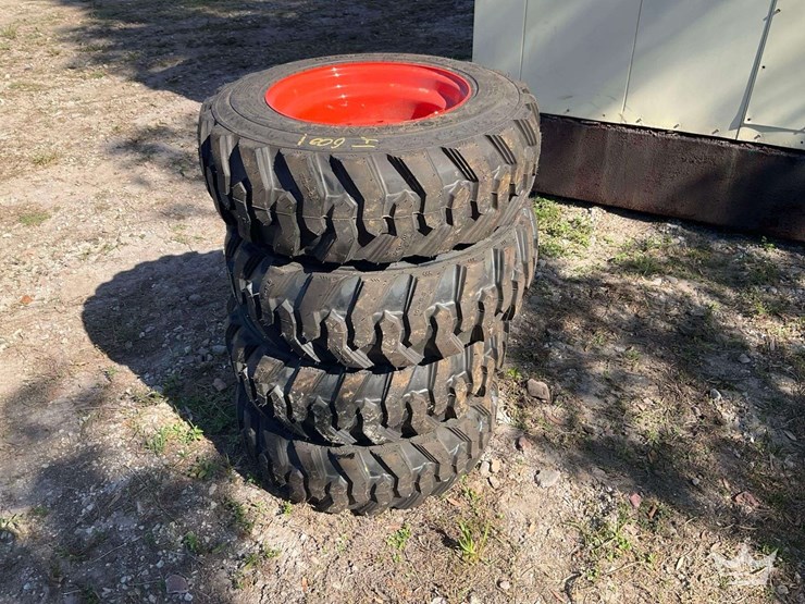set-of-4-unused-10-16.5n.h.s.-forerunner-skid-steer-wheels-and-tires-image-3