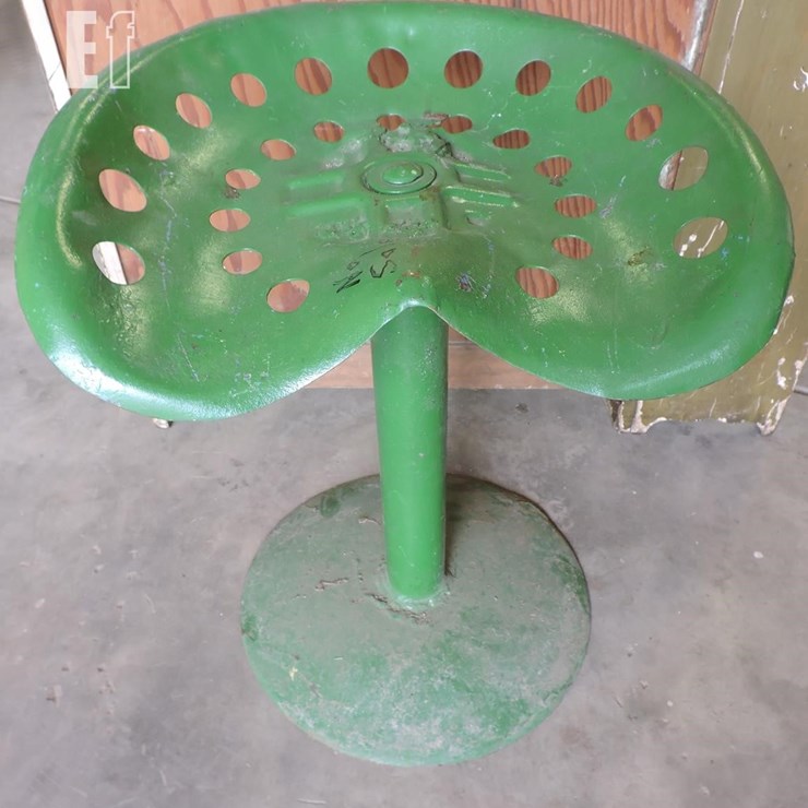 TIN IMPLEMENT SEAT ON STAND, 22” TALL