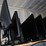 two-shelves-(top/-bottom-shelf)-of-flat-screen-monitors-&-laptops,-desktop-computers,-fax-machine-&-image-7