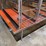 10-sections-of-orange-metal-floor-grates-image-1