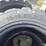 set-of-4-unused-10-16.5n.h.s.-forerunner-skid-steer-tires-image-2