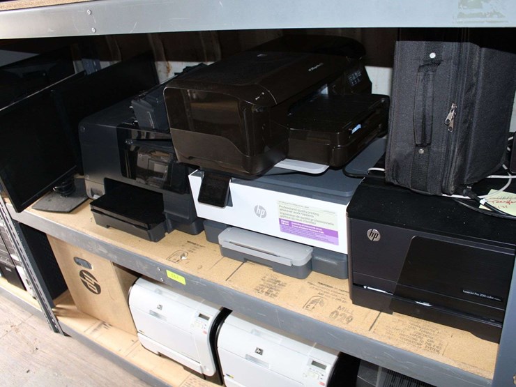 four-shelves-of-desktop-computers,-dell-laptops,-printers-image-6