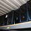 four-shelves-of-desktop-computers-&-laptop-computers-image-3