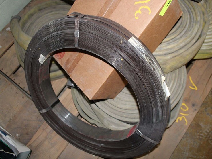 pallet-of-firehoses-and-a-roll-of-strapping,-and-more-metal-image-2