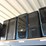 four-shelves-of-desktop-computers-&-flatscreen-monitors-(cooler-master-computers)-image-3