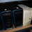 three-shelves-of-desktop-computers,-printers,-&-flat-screen-monitors-image-6