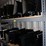 three-shelves-of-flat-screen-monitors-&-one-lg-flat-screen-tv-image-1