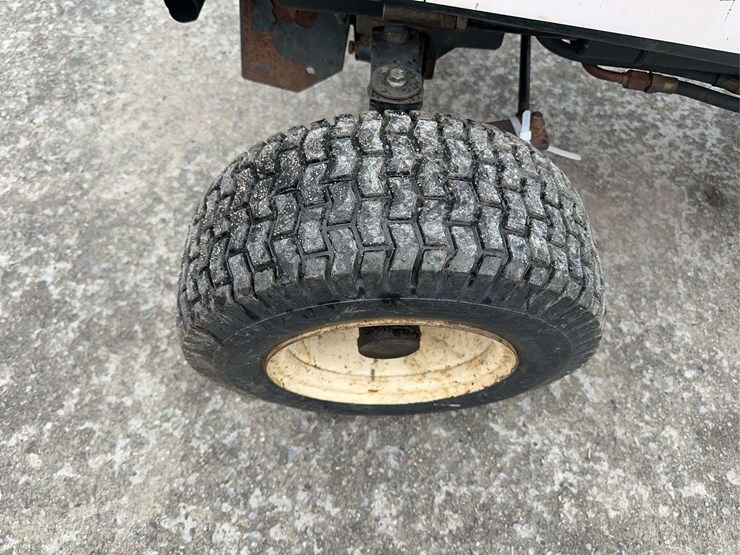 bolens-diesel-lawn-tractor-with-50”-mower-deck,-48”-blower-and-box-of-attachments-image-10