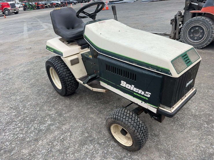 bolens-diesel-lawn-tractor-with-50”-mower-deck,-48”-blower-and-box-of-attachments-image-3