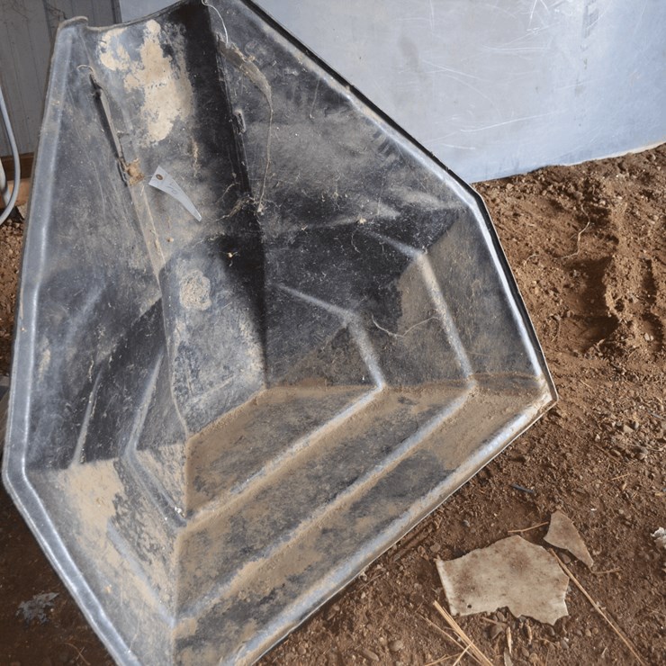 Poly hopper boot for grain auger