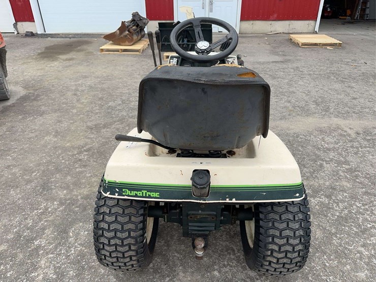 bolens-diesel-lawn-tractor-with-50”-mower-deck,-48”-blower-and-box-of-attachments-image-6