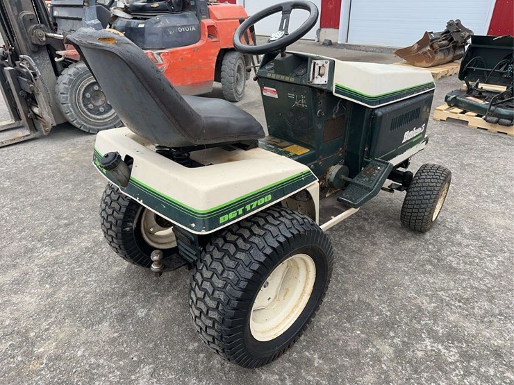 bolens-diesel-lawn-tractor-with-50”-mower-deck,-48”-blower-and-box-of-attachments-image-5