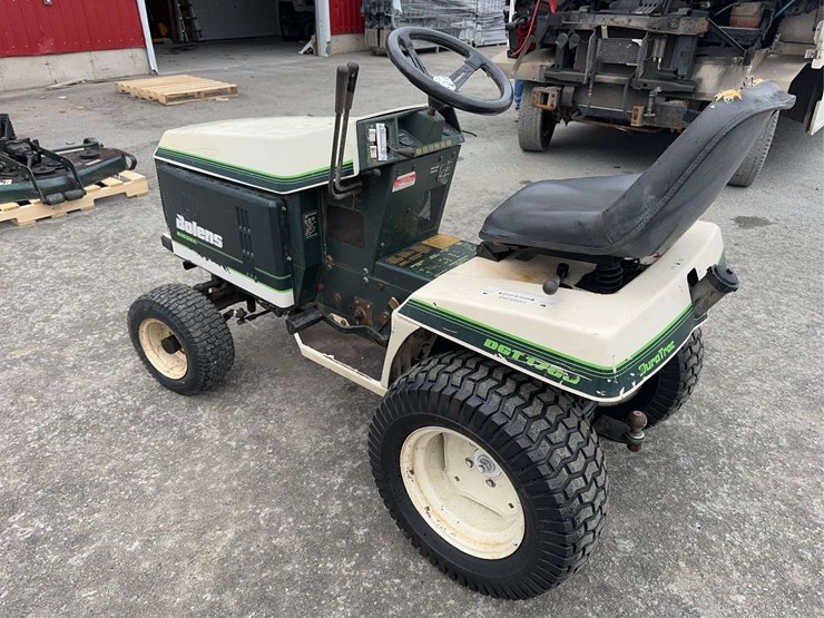bolens-diesel-lawn-tractor-with-50”-mower-deck,-48”-blower-and-box-of-attachments-image-7