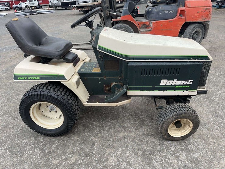 bolens-diesel-lawn-tractor-with-50”-mower-deck,-48”-blower-and-box-of-attachments-image-4