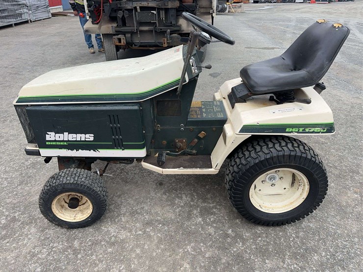bolens-diesel-lawn-tractor-with-50”-mower-deck,-48”-blower-and-box-of-attachments-image-8