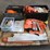 lot-of-chain-saw-parts:-new-chain-saw-bars,-chain-saw-files,-safety-chaps-&-helments-image-1