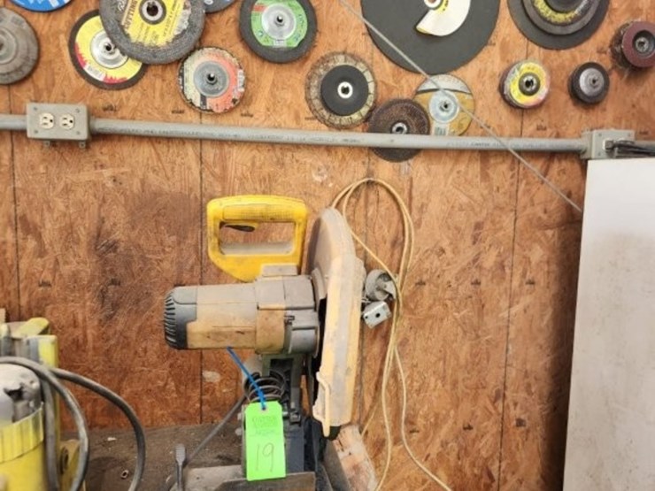 dewalt-chop-saw-w/-extra-misc.-disc-on-wall-image-1
