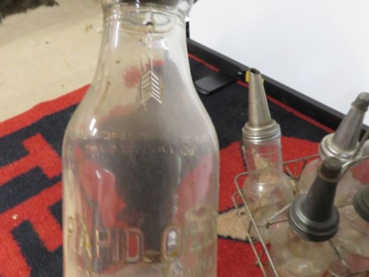 glass-oil-bottles-in-rack-image-7