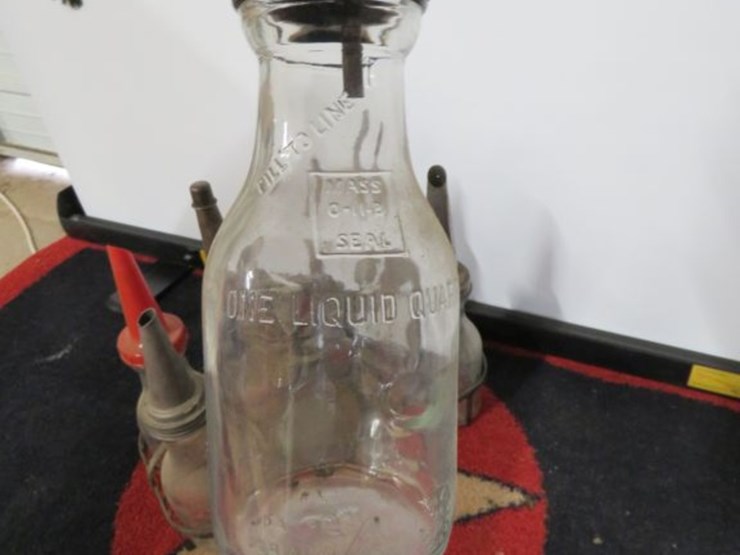 glass-oil-bottles-in-rack-image-4