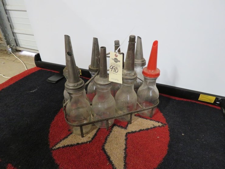 glass-oil-bottles-in-rack-image-1