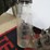 glass-oil-bottles-in-rack-image-6