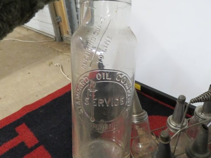 glass-oil-bottles-in-rack-image-6