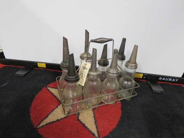 glass-oil-bottles-in-rack-image-1