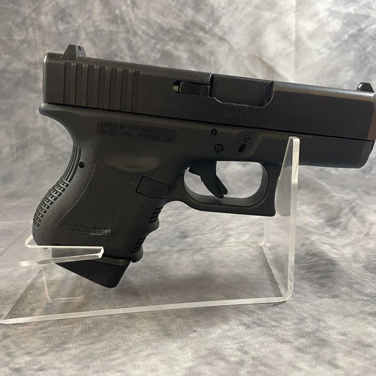 #10298 • Glock Model 27 40 S&W Pistol, SN: NWT212