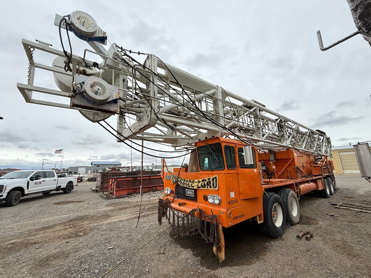 franks-mobilrig-300-1287/160-dtd-ht-96’-215k-4-axle-well-service-workover-rig-image-1