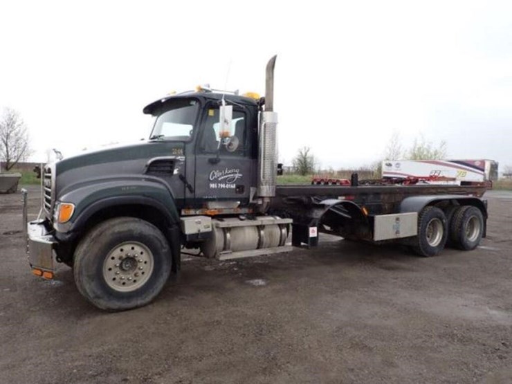2004-mack-cv713-granite-t/a-rolloff-truck-1m2ag10c-image-1