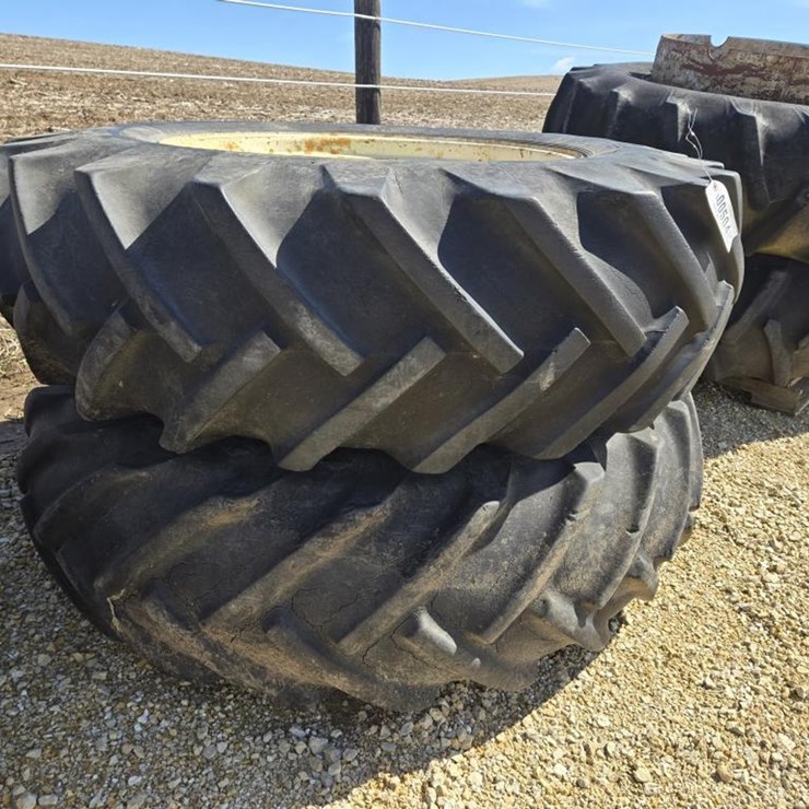 #504 • (2) 18.4 X 34 TRACTOR TIRES ON 9 BOLT DUAL RIMS