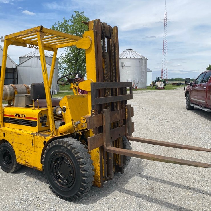 White LP gas forklift.
