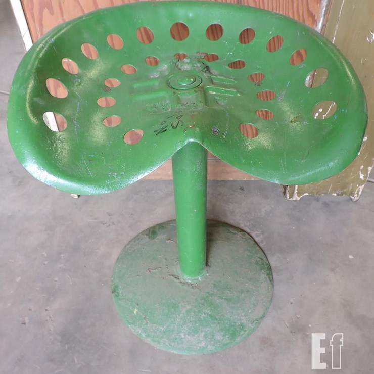 TIN IMPLEMENT SEAT ON STAND, 22” TALL