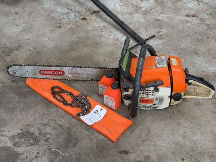stihl-034-av-super-chainsaw-with-accessories-image-1
