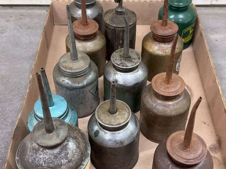 oil-can-assortment-with-advertising-graphics-image-12