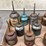 oil-can-assortment-with-advertising-graphics-image-2
