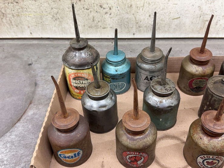 oil-can-assortment-with-advertising-graphics-image-2