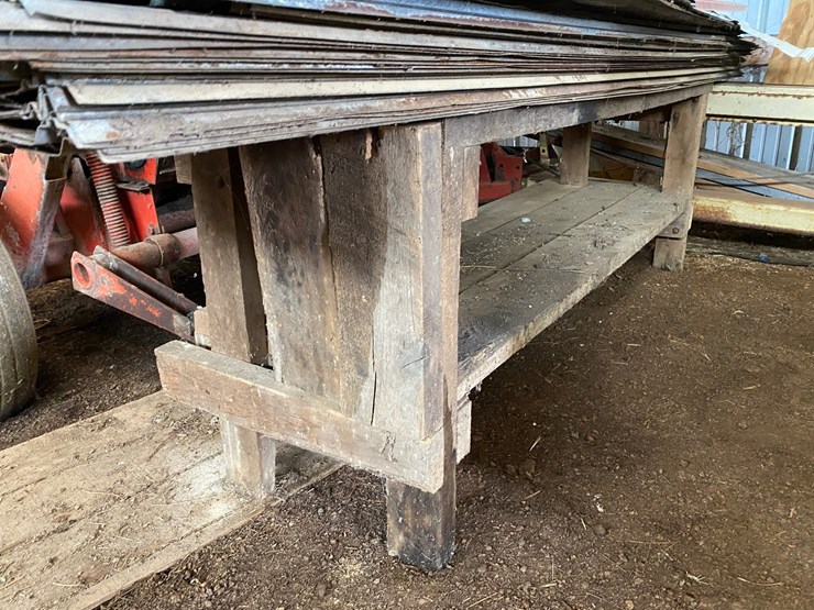 #3593-•-wooden-work-bench-with-assortment-of-sheet-metal-siding-image-4