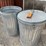 #4185-•-(2)-metal-trash-cans-with-lids-image-1