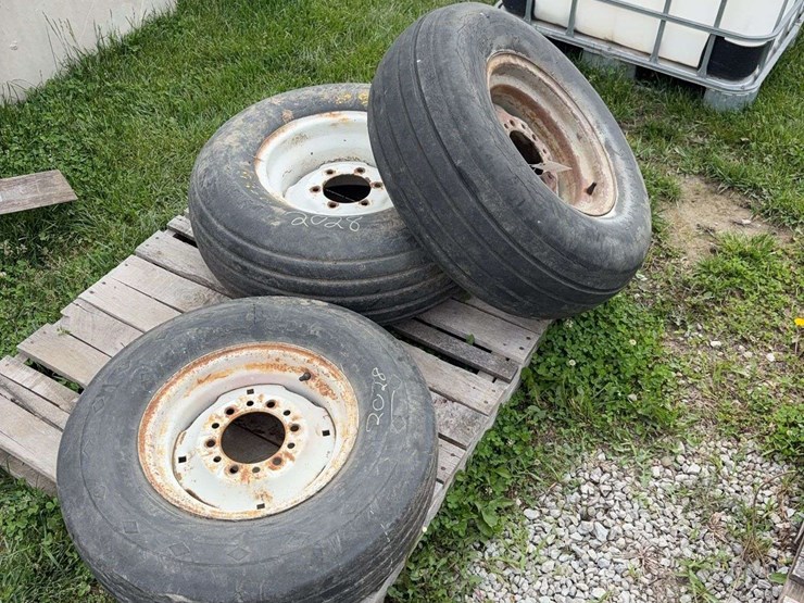 2-implement-tires-11l-15-on-6-bolt-rims,-1-implement-tire-8.5l-14-on-6-bolt-rim-image-1