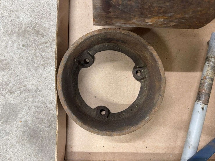 assorted-collection-of-belts,-pulleys,-and-metal-parts-image-4
