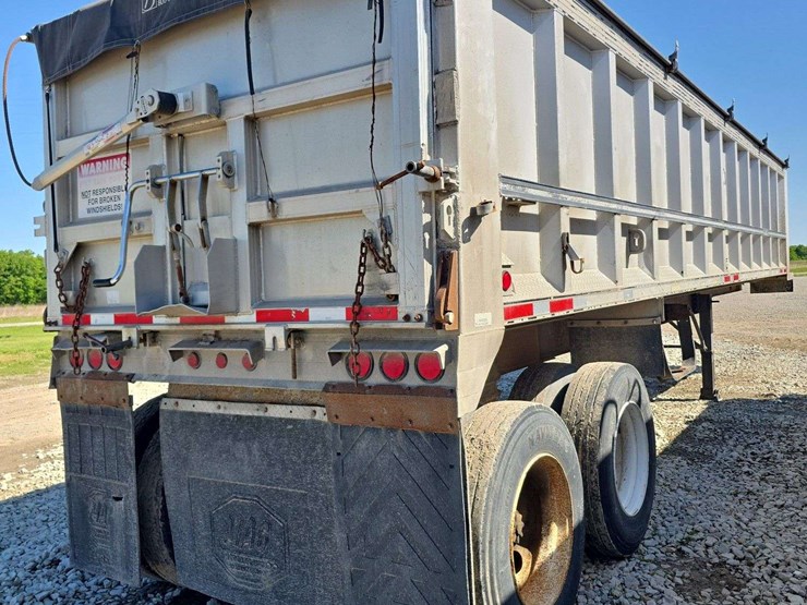 1997-mac-34ft-dump-trailer,-good-tires,-new-hoist-2-years-ago,-new-liner-2-years-ago,-tarp-and-power-opener,-2-years-ago,-and-new-jacks,-vin#-1m9d83421vc096684-image-7