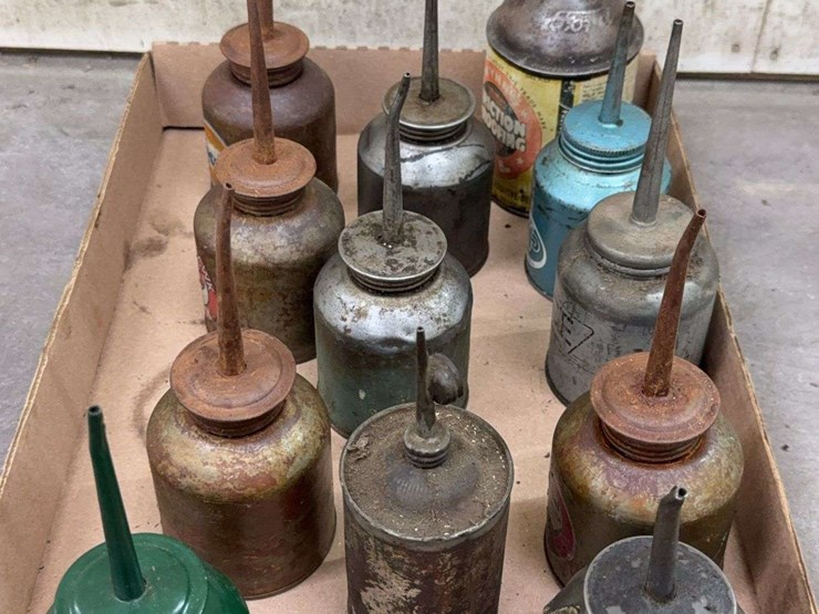 oil-can-assortment-with-advertising-graphics-image-10