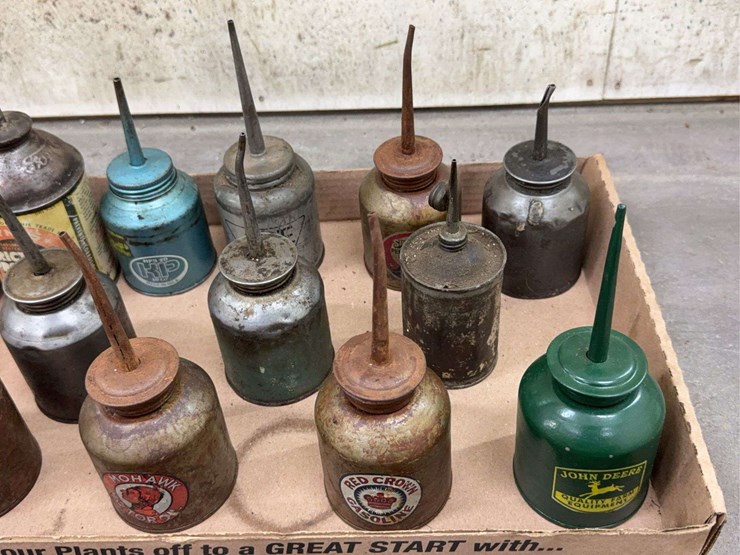 oil-can-assortment-with-advertising-graphics-image-3