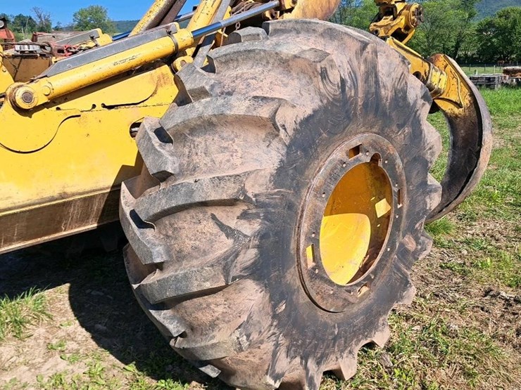 2006-deere-648-image-35