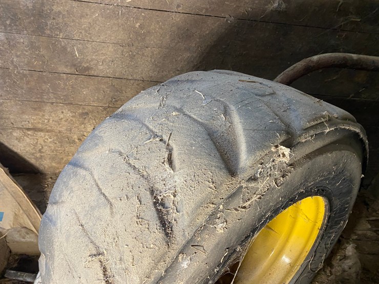 #3558-•-(4)-caterpillar-skid-steer-tires-on-rims-image-3