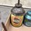 oil-can-assortment-with-advertising-graphics-image-6
